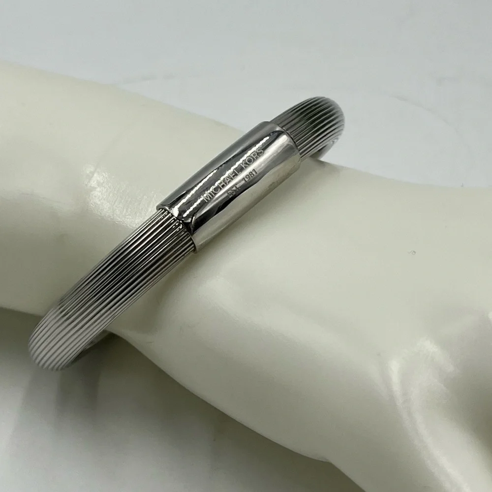 Michael Kors MK6190040‎ Solid Stainless Steel Ribbed Logo Plaque Bracelet